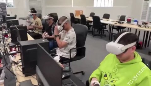 A Telexistence TX SCARA robot arm stocking beverages in a Japanese convenience store.